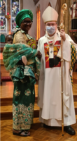 St Daniel Comboni - African Lady with Archbishop.PNG