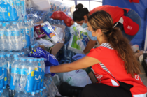 Volunteers distribute aid in Beriut.PNG